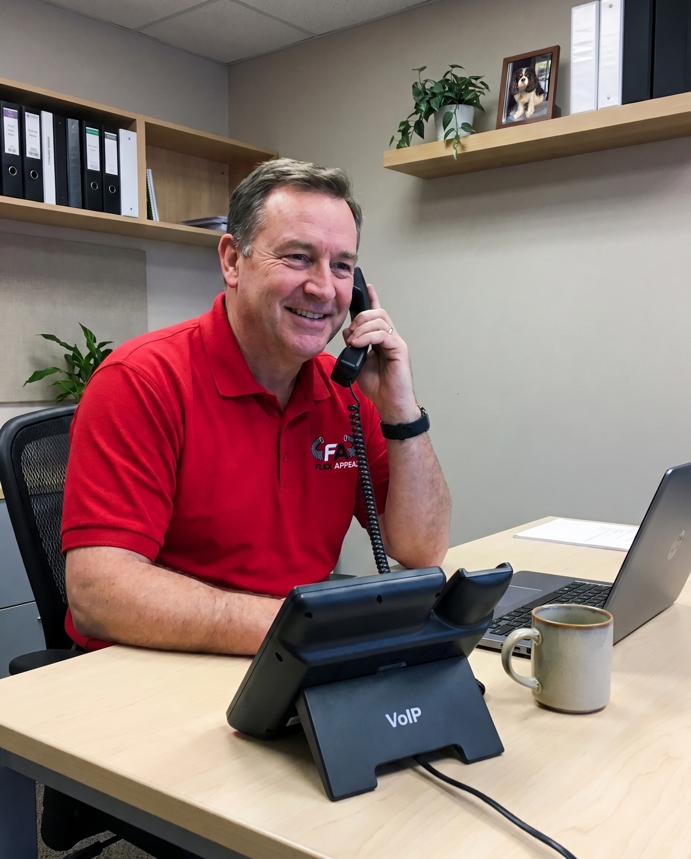 Flex Appeal customer support advisor taking a call in the office